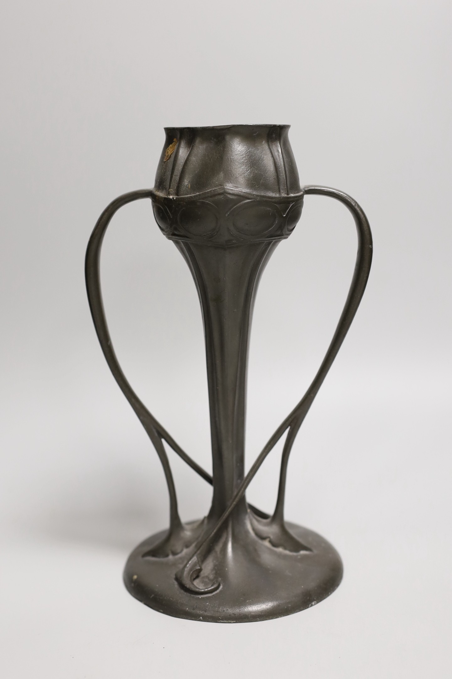 A Liberty & Co. Tudric pewter posy vase, designed by Archibald Knox, 25cms high